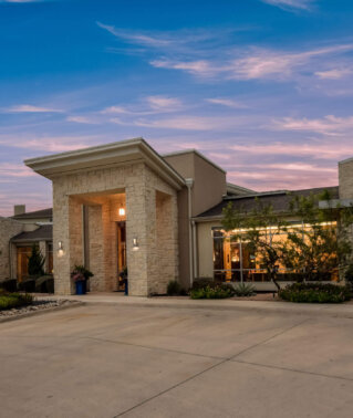 Exterior leasing office at twilight